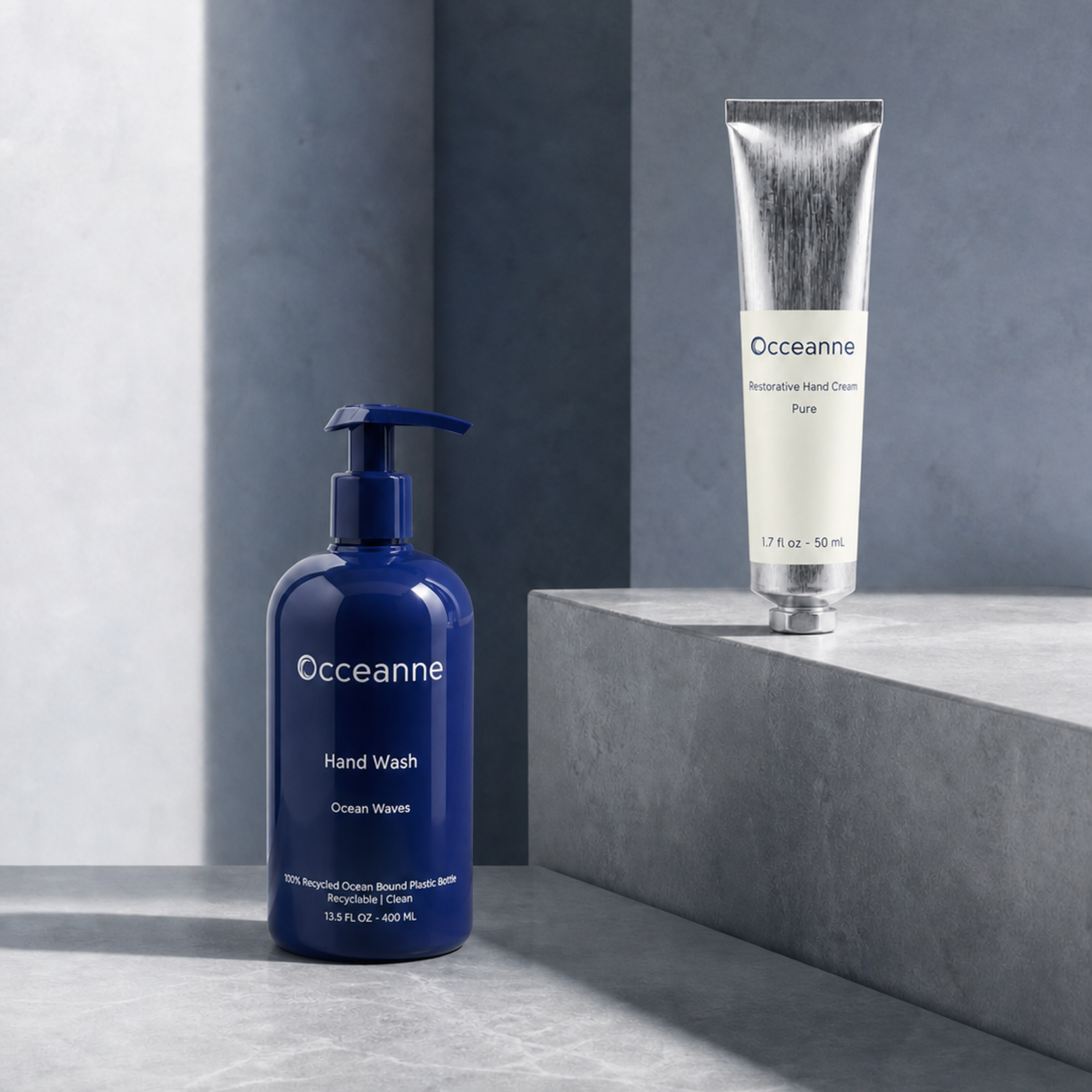 Ocean Waves Hand Wash and Pure Restorative Hand Cream displayed on stone plinths